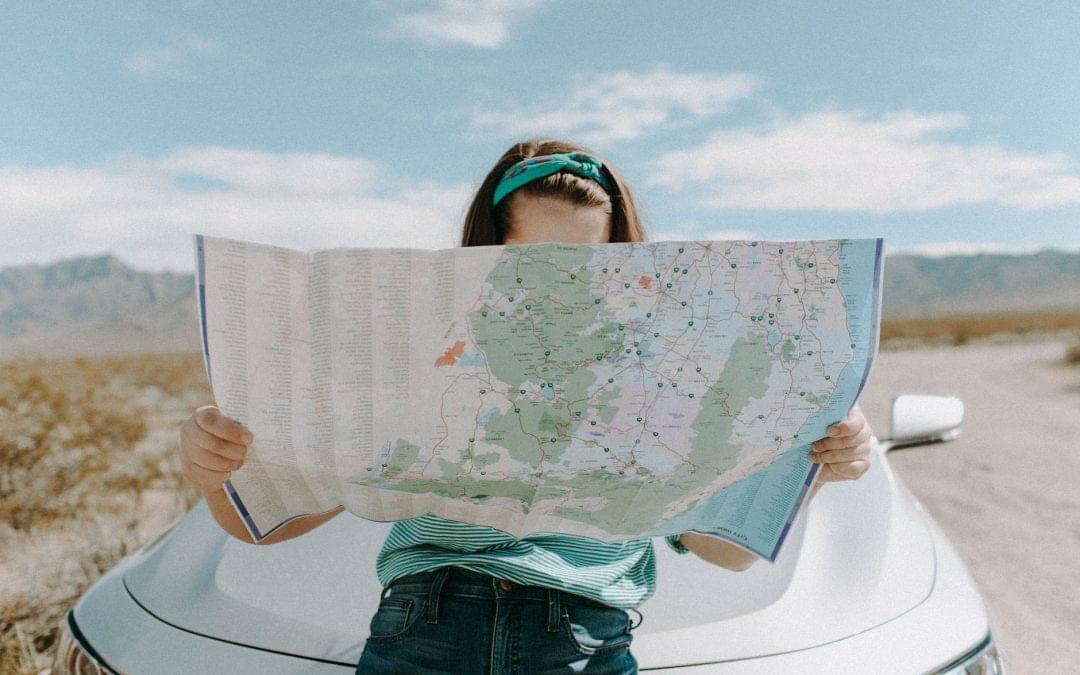 eWOM platforms as productivity catalyzers - woman looking at the map